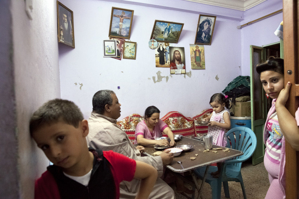 A family has dinner in Minya, September 2013. Credit: Bieke Depoorter/Magnum Photo