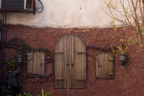 Three wooden windows in a cafe in Rainbow Street